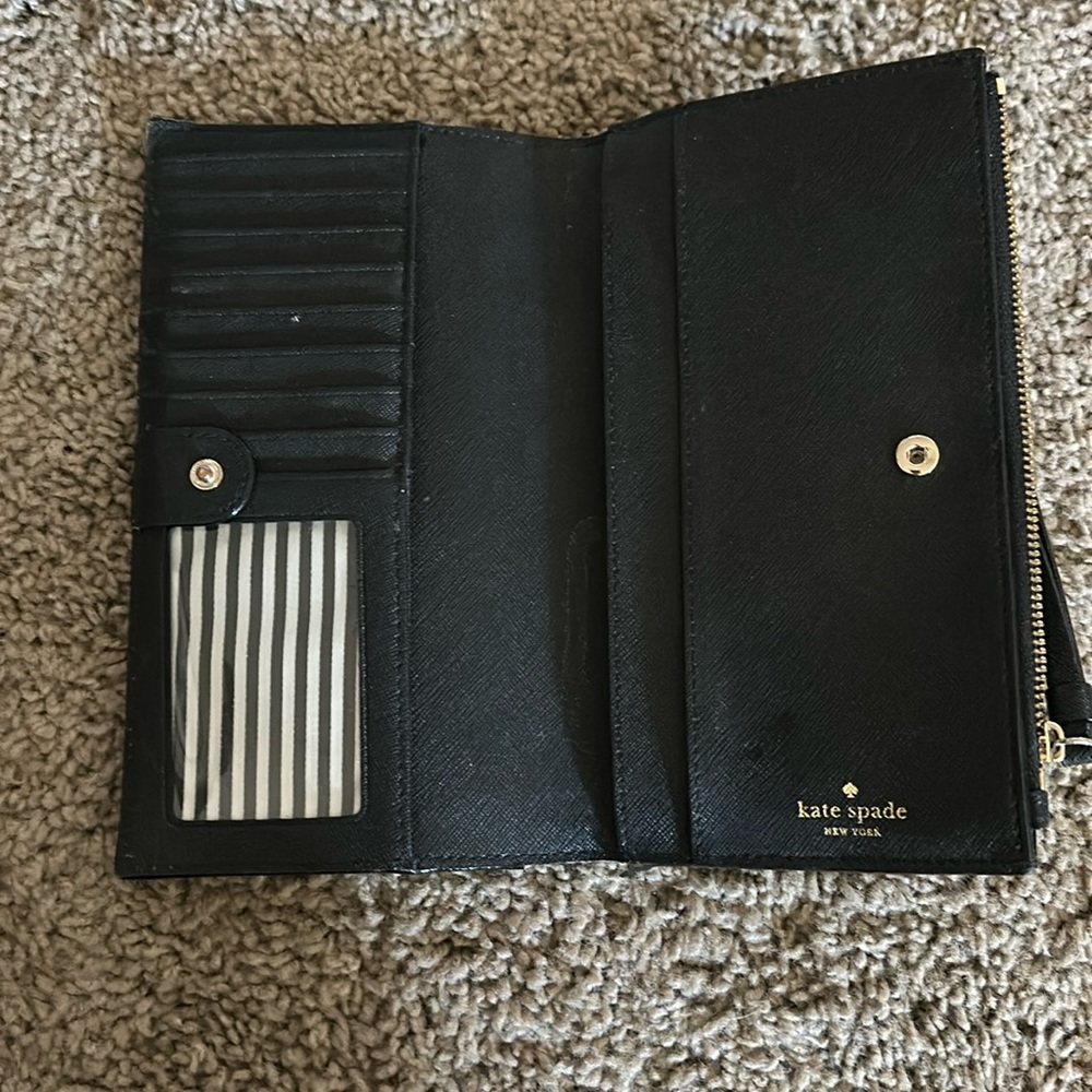 Kate spade wallet!!! Perfect for any size bag or use as a wristlet